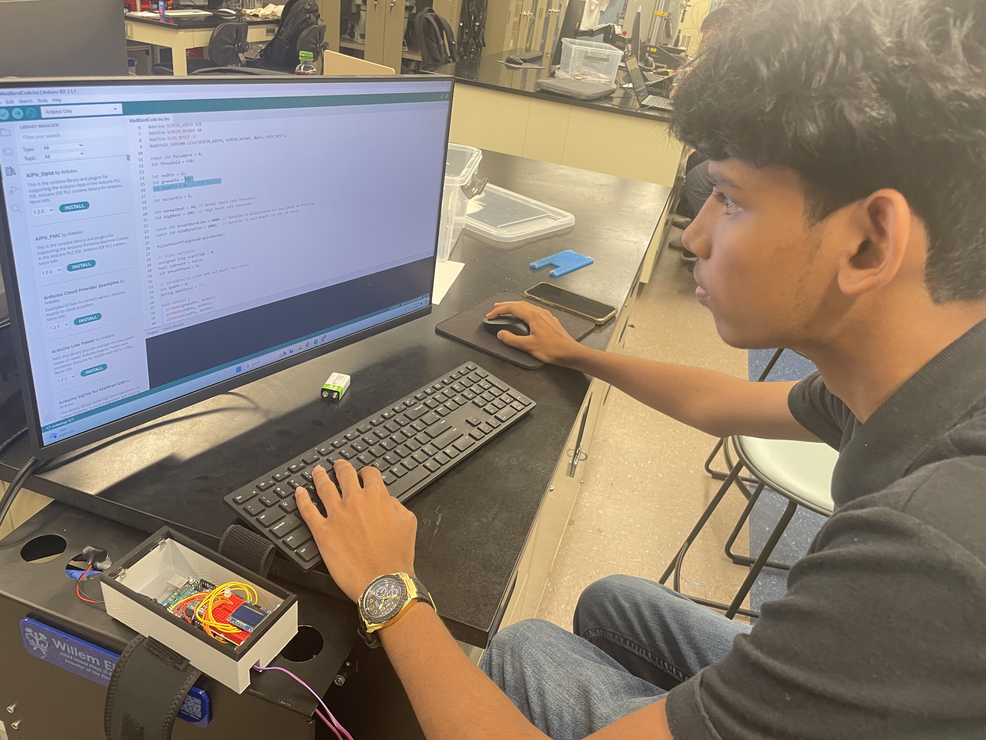 Ishmael working on project